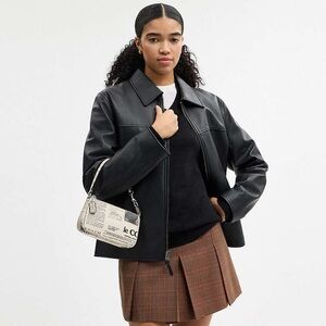 Coach Nolita 19
With Newspaper Print